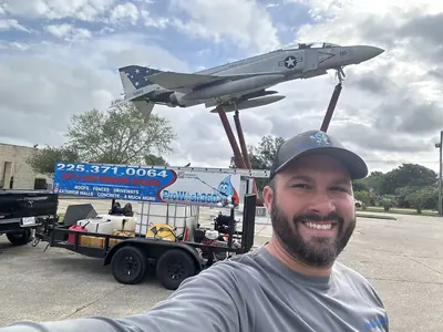 Tommy Ashley, owner of ProWash360, with the company trailer in Baton Rouge