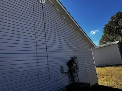 The same vinyl siding clean after soft washing