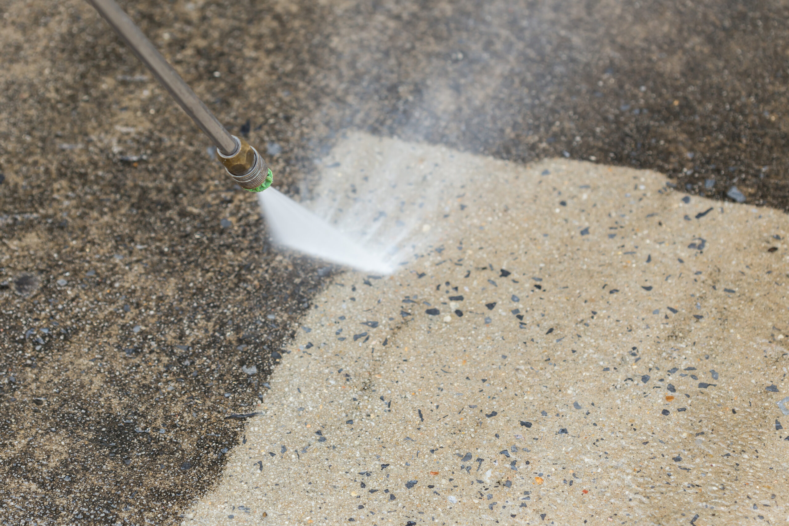 Outdoor floor cleaning with high pressure water jet